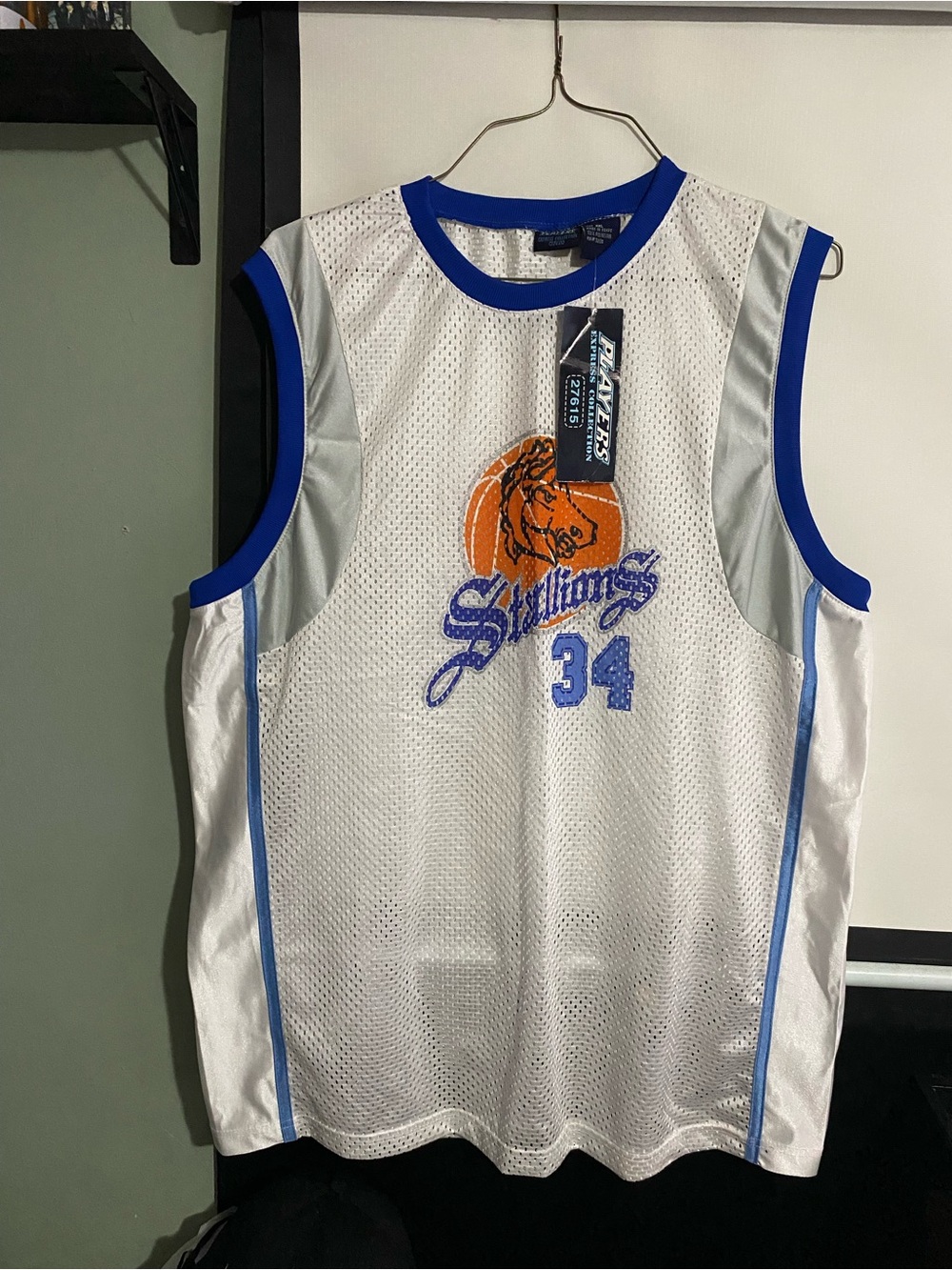 White & Blue Sleeveless Basketball Jersey with Orange Graphic -